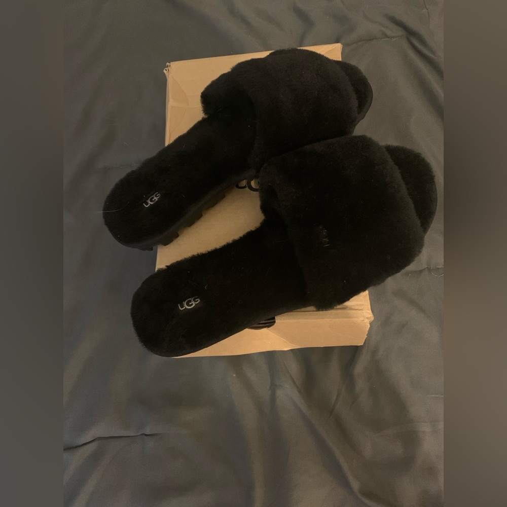 Women’s UGGS slide on slippers. Size 11. Brand new.